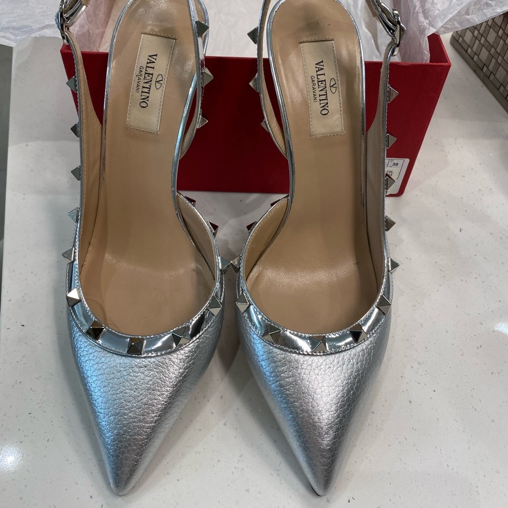 Barely worn Valentino sling back silver shoes